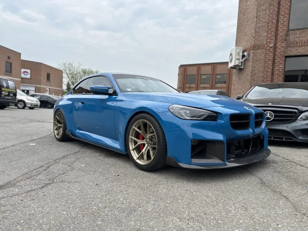 Blue BMW M2 outside White Eagle Motors